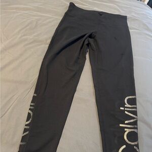 Calvin Klein Black Stretch Performance Leggings with White Lettering. Large